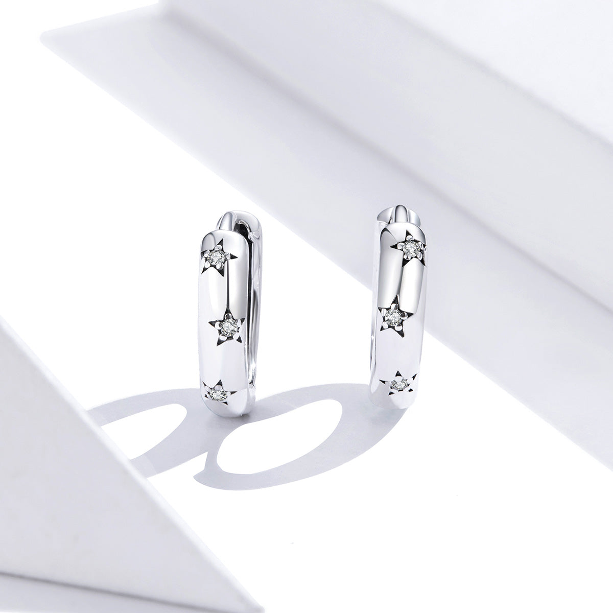 Sterling Silver Sparkling Stars Huggie Hypoallergenic Earrings