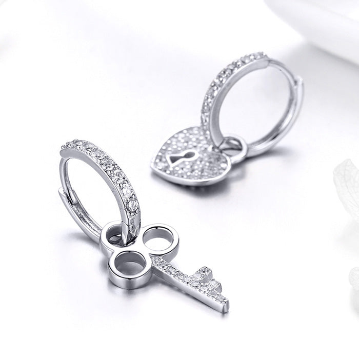 Sterling Silver Love Key Hypoallergenic Huggie Earrings