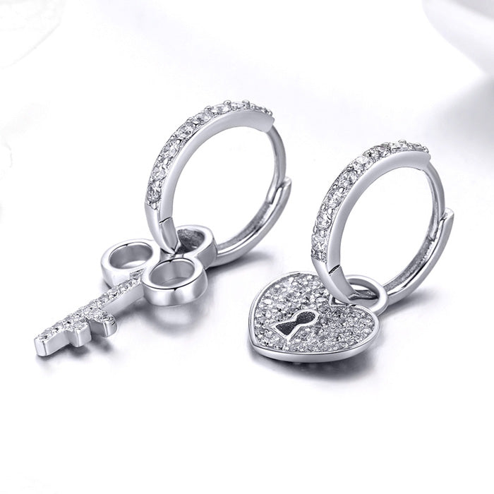 Sterling Silver Love Key Hypoallergenic Huggie Earrings